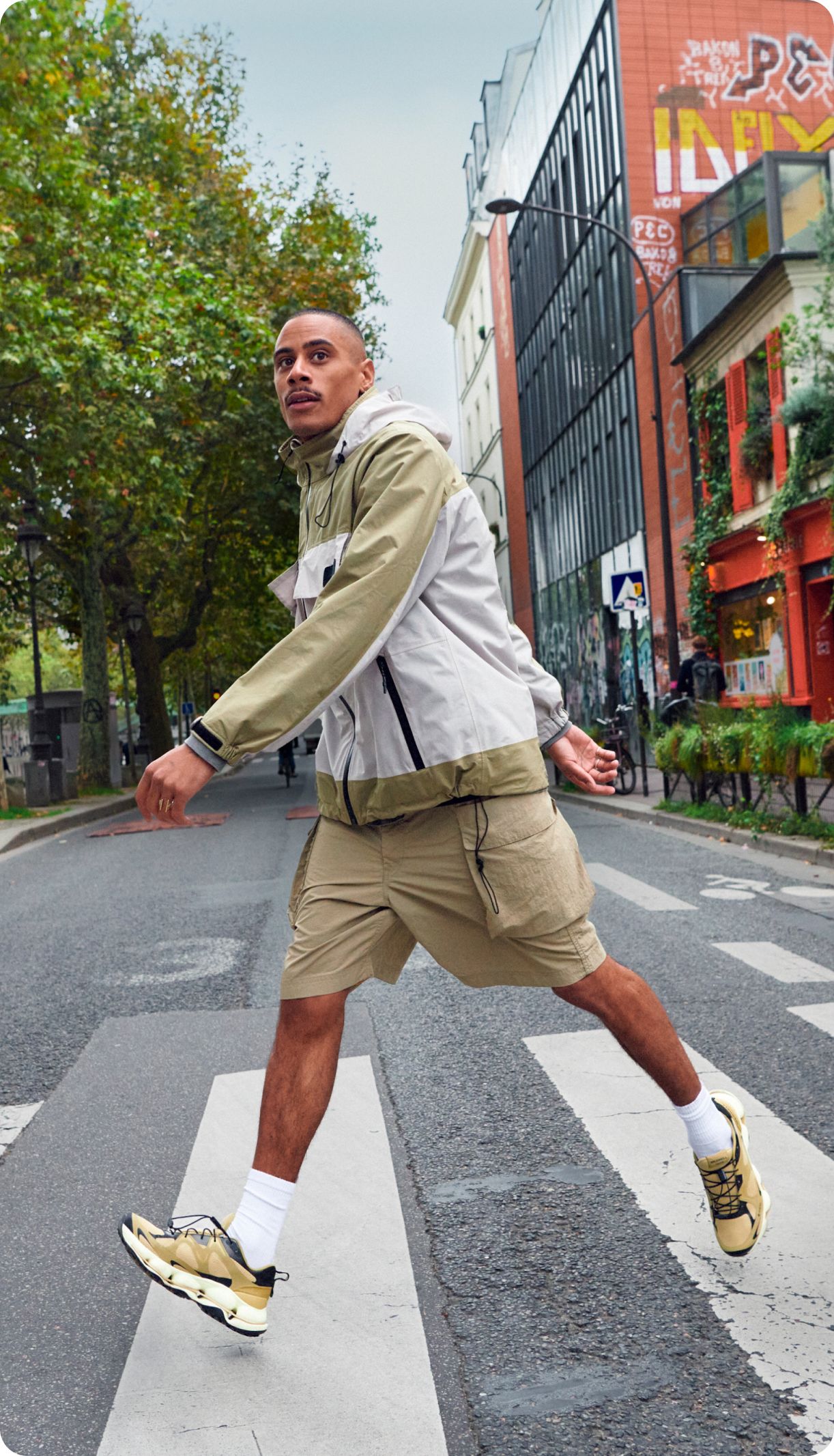 Man
  walking on the sidewalk